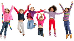 Children Jumping in the air having fun. The children are from different backgrounds. Boys and Girls.