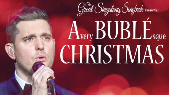 Michael Bubble Singing. The Background is red